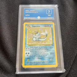 Vaporeon 12/64 Holo Rare Jungle Set 1999 WOTC Vintage Pokemon PG Graded 7 NM - Image 1