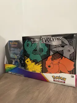 Pokemon TCG Evolving Skies Elite Trainer Box with Vaporeon v Tin Costco Bundle - Image 1