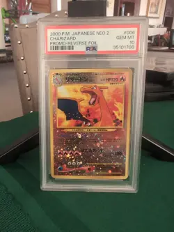 Pokemon, 2000, PSA 10 Charizard Promo (Swirl), Reverse Foil, Neo Premium File 2 - Image 1
