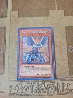 YUGIOH BLUE-EYES SHINING DRAGON LCKC-EN008 SECRET UNLIMITED ED NM - Image 1