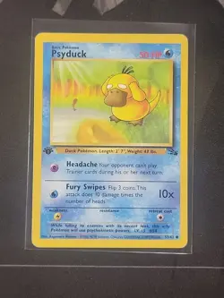 1999 Pokemon Card 1st Edition Fossil Psyduck #53/62 Moderately played - Image 1