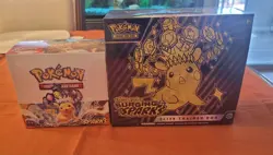 Pokemon TCG Surging Sparks Bundle Factory Sealed ETB And Booster Box - Image 1