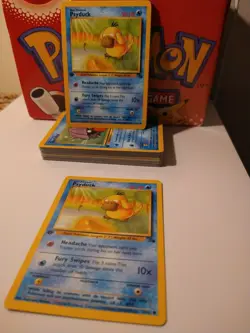 1999 Pokemon Fossil 1st Edition Psyduck #53 NM-MT - Image 1
