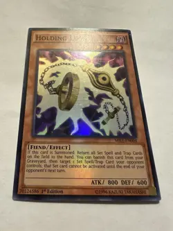 Yu-Gi-Oh! Holding Legs MIL1-EN004 Super Rare 1st Ed Lightly Played (B) - Image 2