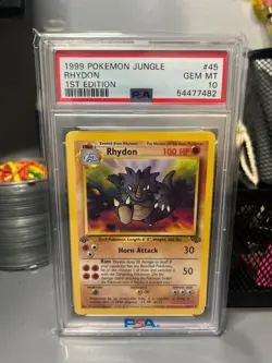 1999 Pokemon Jungle Rhydon 45/64 1st Edition Non-Holo Card PSA 10 GEM MINT - Image 1