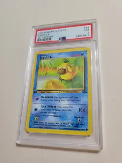 Psyduck - Pokemon Fossil First 1st Edition #53 - Near Mint PSA 7 - Image 1