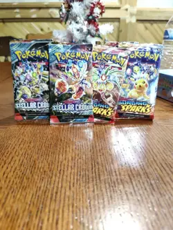 5x Pokemon TCG Scarlet & Violet Surging Sparks Booster Pack - Plus 2x Stellar Cr - Image 1