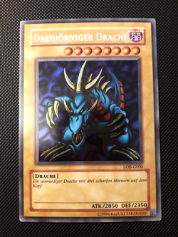 Yu-Gi-Oh! Dreihorniger Drache, LOB-G000, Secret Rare, 2. Auflage, Deutsch, NM - Image 1