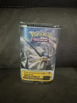 Pokemon Sun and Moon Ultra Prism Solgaleo Tin Deck Protector - Image 1