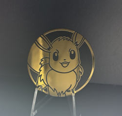 Eevee LARGE GOLD MIRROR HOLO Prismatic Evolution Pokemon Card TCG Collector Coin - Image 1