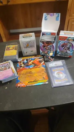 Large Pokemon Card Lot And Surprise Gem Mint 10 CGC Graded Card - Image 1