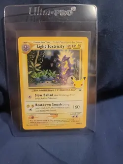 Pokemon TCG Light Toxtricity SWSH137 English Holo Card Celebrations Rare - Image 1