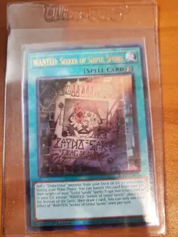 WANTED: Seeker of Sinful Spoils RA03-EN074 Collector's Rare With Top Loader - Image 1