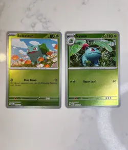 Bulbasaur 001/132 and Ivysaur 002/132 Mega Evolution Reverse Holo Pokemon Cards - Image 1