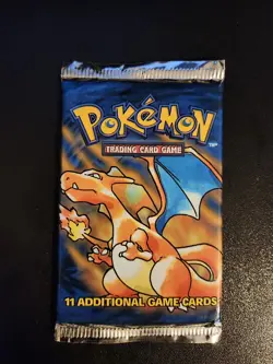 1999 Pokemon TCG Base Set Unlimited Booster Pack | Factory Sealed, Charizard Art - Image 1