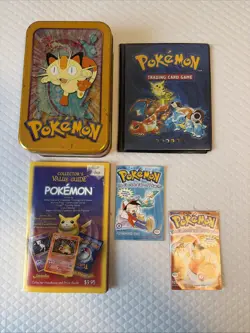 Pokemon Lot With vintage Tin Box, Comic Tales, Card Book, And Value Guide - Image 1