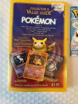 Pokemon Lot With vintage Tin Box, Comic Tales, Card Book, And Value Guide - Image 2