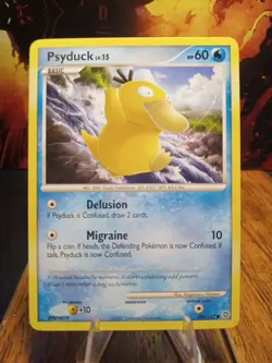 2007 Pokemon Secret Wonders Psyduck #100 Extremely LP - Image 1
