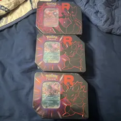 ??????Pokemon TCG: Team Rocket Tin Sealed [Set of 3] ?????? - Image 1
