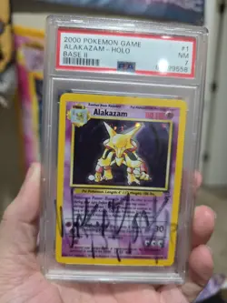 1999 POKEMON Alakazam Base Set 2 #1 HOLO PSA 7 - Image 1