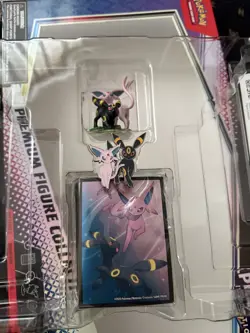 Pokemon TCG - Prismatic Evolutions Figure Collection Sleeves, Pin and Figurine - Image 2