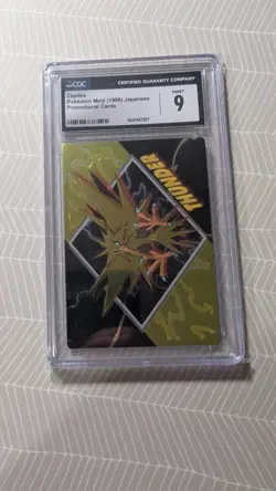 1999 Pokemon Meiji Promo Embossed Card Thunder Zapdos, CGC9 - Image 1