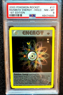 PSA 8 NM/MINT Rainbow Energy 17/82 1ST EDITION Team Rocket HOLO Pokemon Card - Image 1