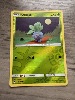Pokemon TCG Oddish 6/214 SM Unbroken Bonds Reverse Holo Common - Image 1