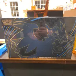 Pokemon TCG Phantasmal Flames Ultra Premium Collection UPC Charizard in hand - Image 1