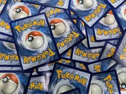 Bulk lot 50 Pokemon Cards + A Mystery Graded Card. - Image 1