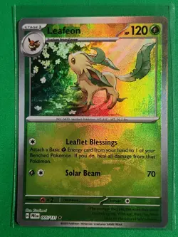 Pokemon TCG SV-Prismatic Evolutions Leafeon #5/131 Rare Poke Ball - Image 1