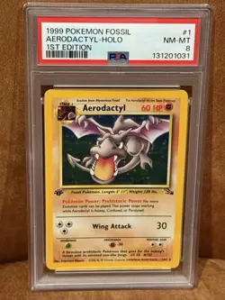 1999 POKEMON FOSSIL 1ST EDITION #1 AERODACTYL - HOLO PSA 8 - Image 1