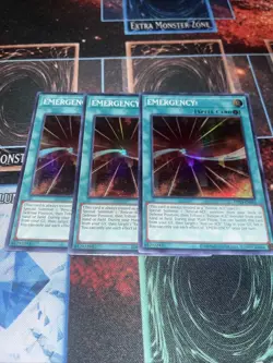 Yugioh x3 OP23-EN010 EMERGENCY! SUPER RARE UNLIMITED EDITION Playset - Image 1