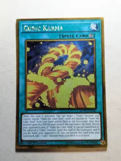 YuGiOh Cubic Karma Gold Rare 1st Edition MVP1-ENG41 - Image 1