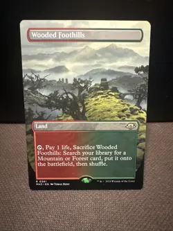 Wooded Foothills (Borderless) Modern Horizons 3 Regular - Image 1