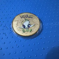Pokemon Celebi Gold Collectible Coin - Image 1
