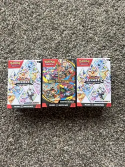 Pokemon Mega Evolution Booster Bundle + 2 Prismatic Evolution Booster Bundle - Image 1