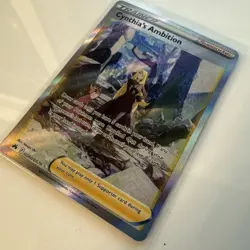 CYNTHIA'S AMBITION GG60/GG70 POKEMON CROWN ZENITH HOLO RARE - Image 1