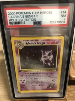 2000 POKEMON GYM HEROES HOLO-1ST EDITION SABRINA'S GENGAR WITH SWIRL PSA 7 - Image 1
