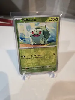 Bulbasaur - (Reverse Cosmos Holo) (Costco Exclusive) 001/165 Miscellaneous Cards - Image 1