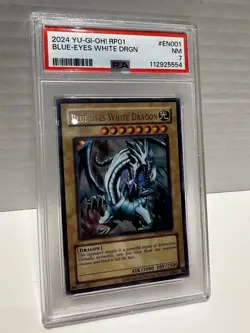 Blue-Eyes White Dragon (RP01-EN001) Ultra Rare, Unlimited PSA7 Yugioh! - Image 1