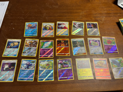 Lot of 19 Reverse Holo Pokemon Cards from the Sun & Moon Era - Image 1