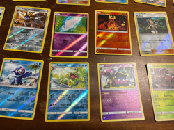 Lot of 19 Reverse Holo Pokemon Cards from the Sun & Moon Era - Image 3