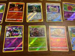 Lot of 19 Reverse Holo Pokemon Cards from the Sun & Moon Era - Image 4