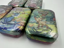 22% OF CODE | Pokemon Prismatic Evolutions Mini Tins 5x Brand New Sealed - Image 3