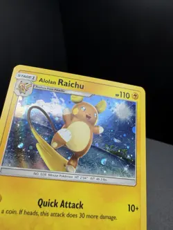 Pokemon TCG Sun & Moon Alolan Raichu SM65 Black Star Promo Cosmos Holo LP - Image 2