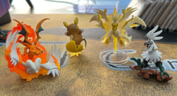 Pokemon 4 Figure Lot - Reshiram Charizard Alolan Raichu Ultra Necrozma Silvally - Image 1