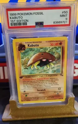 Pokemon Fossil Kabuto 1st Edition PSA 9 Mint 1999 With Stand - Image 1