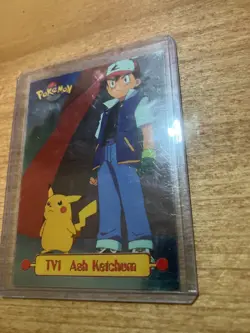 1999 Topps Pokemon Series 1 TV Animation TV1 Ash Ketchum Foil Blue Logo NM - Image 1