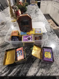 pokemon cards lot over 1,000 card, tins, and covers - Image 1